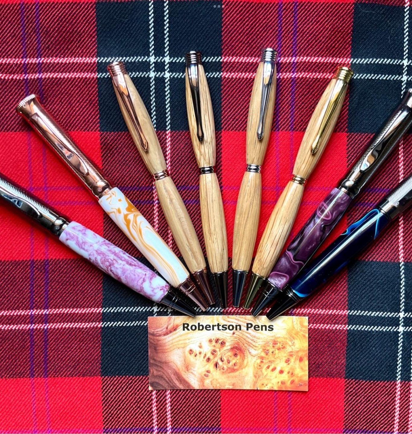 Different pens made from whisky barrels and acrylic personalised designs